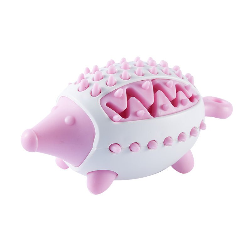 Balle distributrice de croquettes rose en silicone, gros plan des picots et rainures