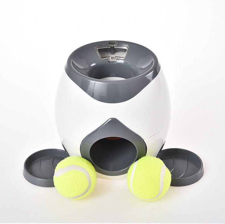 Lance-balles automatique pour chien blanc et gris foncé avec ouverture et balles