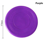 Disque frisbee flottant violet pour chien, rond avec rainures concentriques.