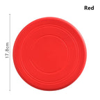 Disque frisbee flottant rouge pour chien, rond et nervuré.