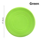 Disque frisbee flottant vert pour chien, rond avec rainures concentriques.